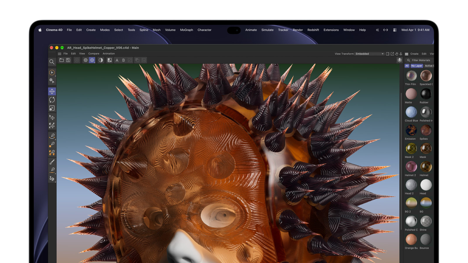 Photo: The MacBook Pro with PROLED XDR Display shows a 3D model of a spiked copper helmet open in Cinema 4D.